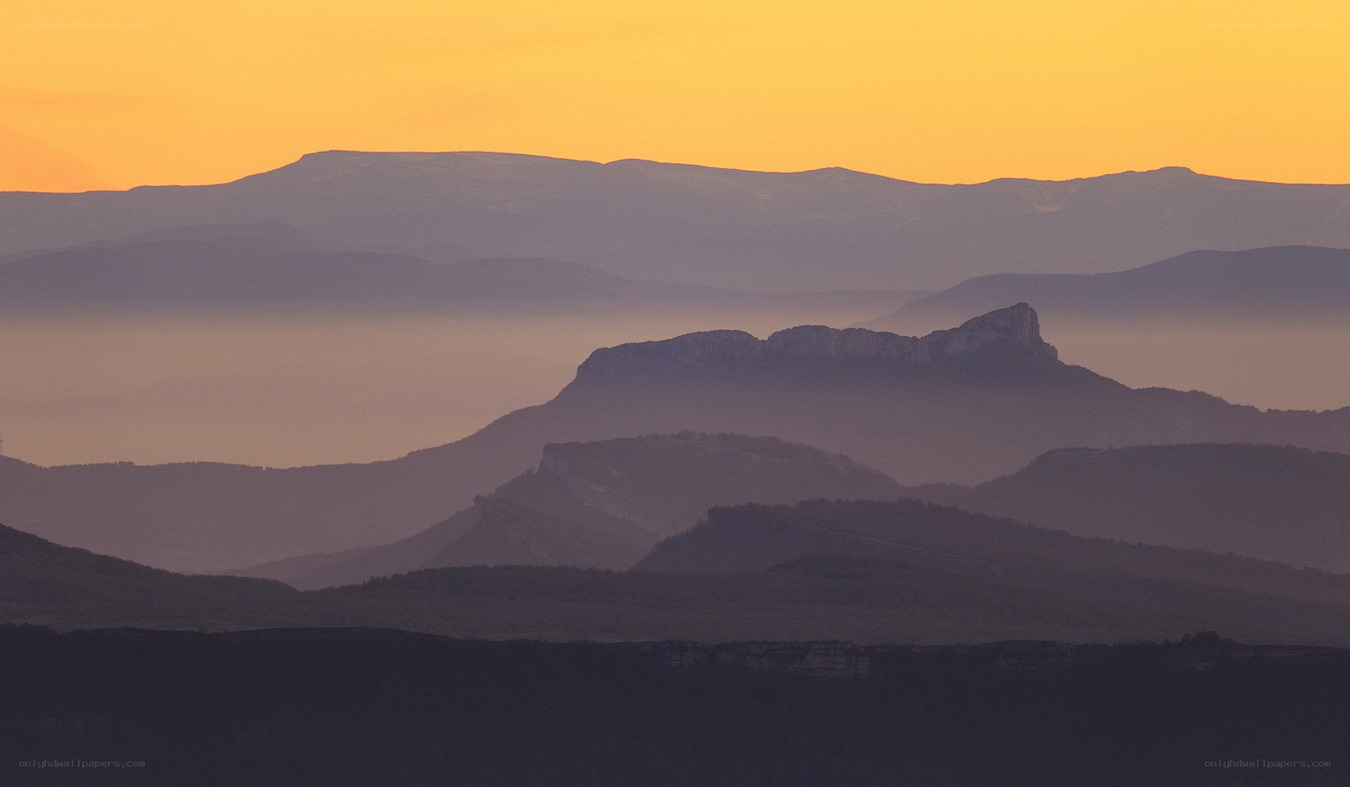 Mountain silhouettes at sunset
