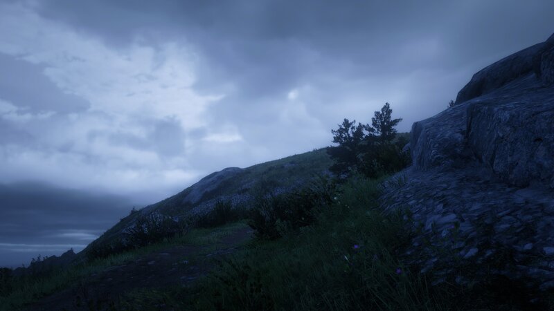 Mountain Slope under Cloudy Sky