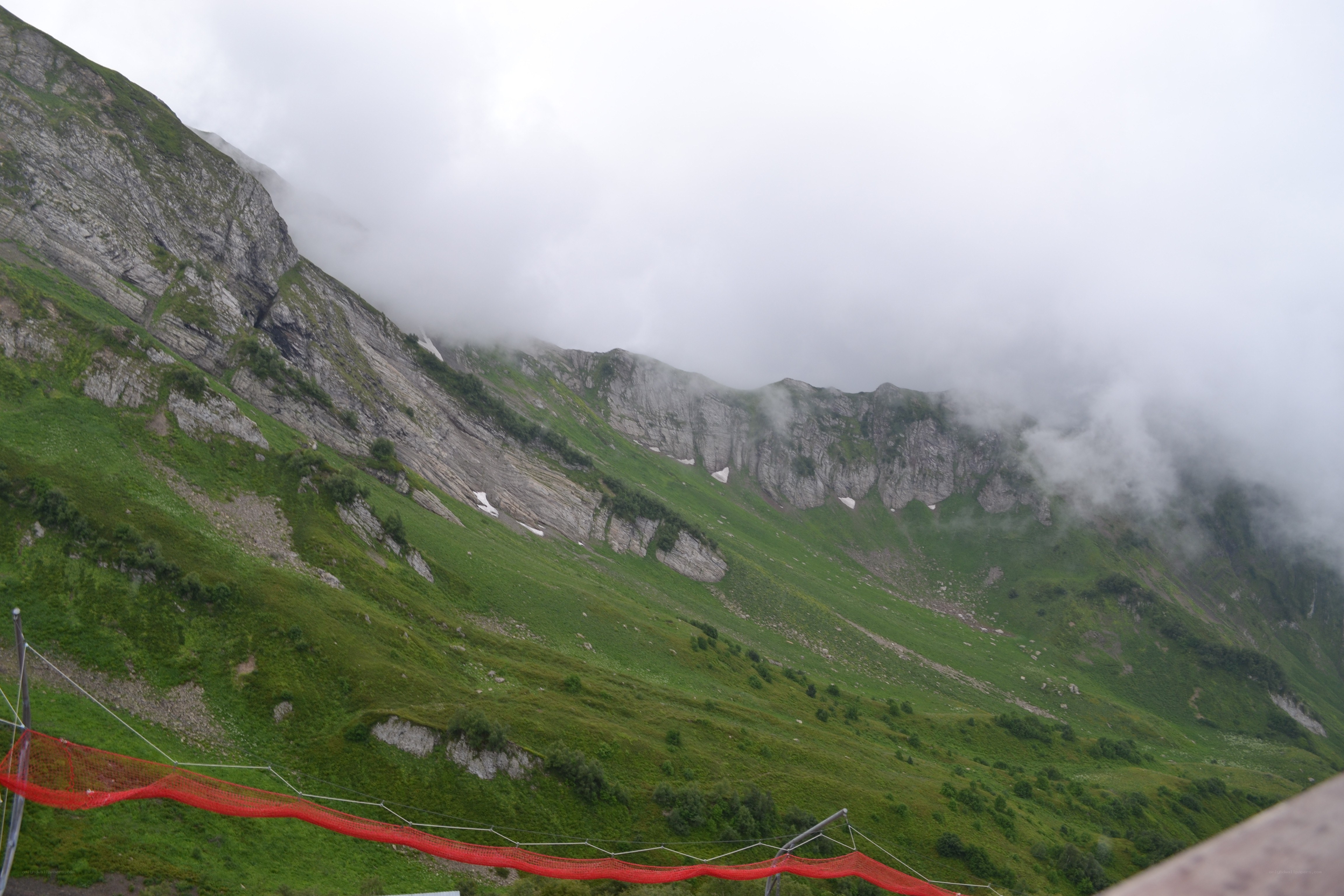 Mountain slope with fog