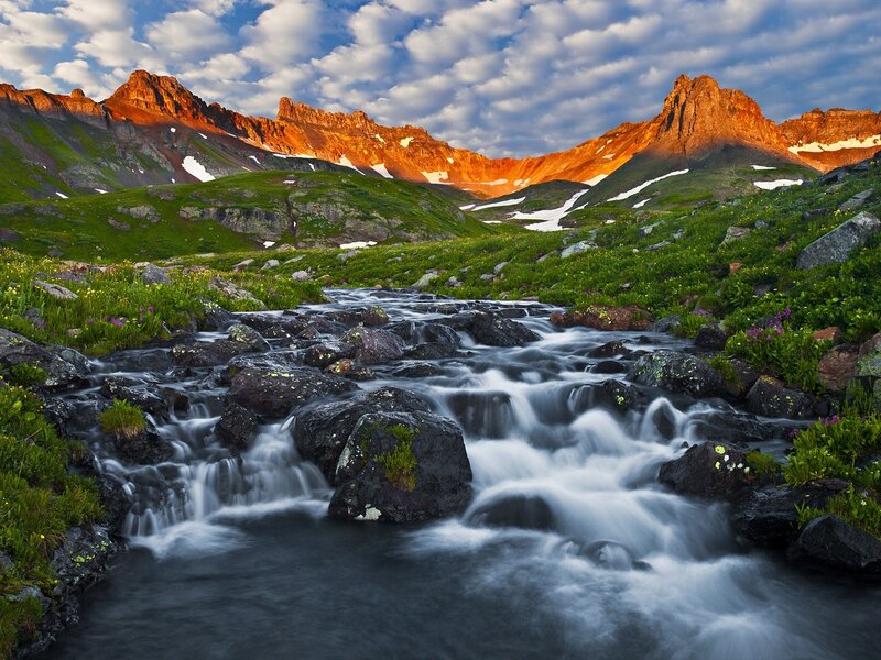 Mountain stream at sunset