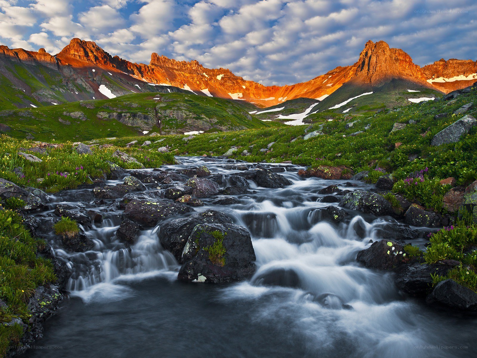 Mountain stream at sunset