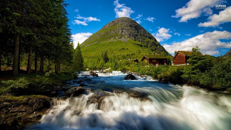 Mountain stream with cabins
