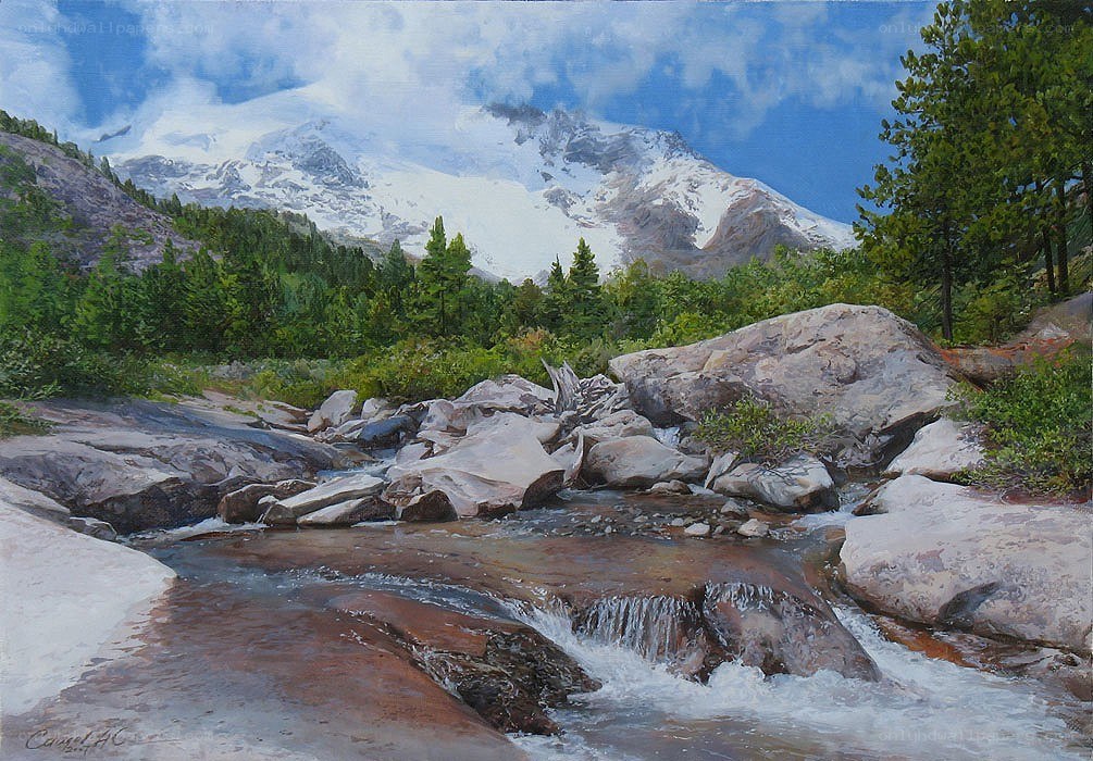 Mountain stream with snow-capped peak