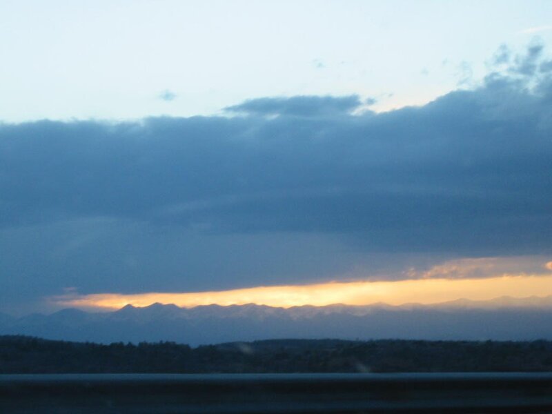 mountain sunset from a car