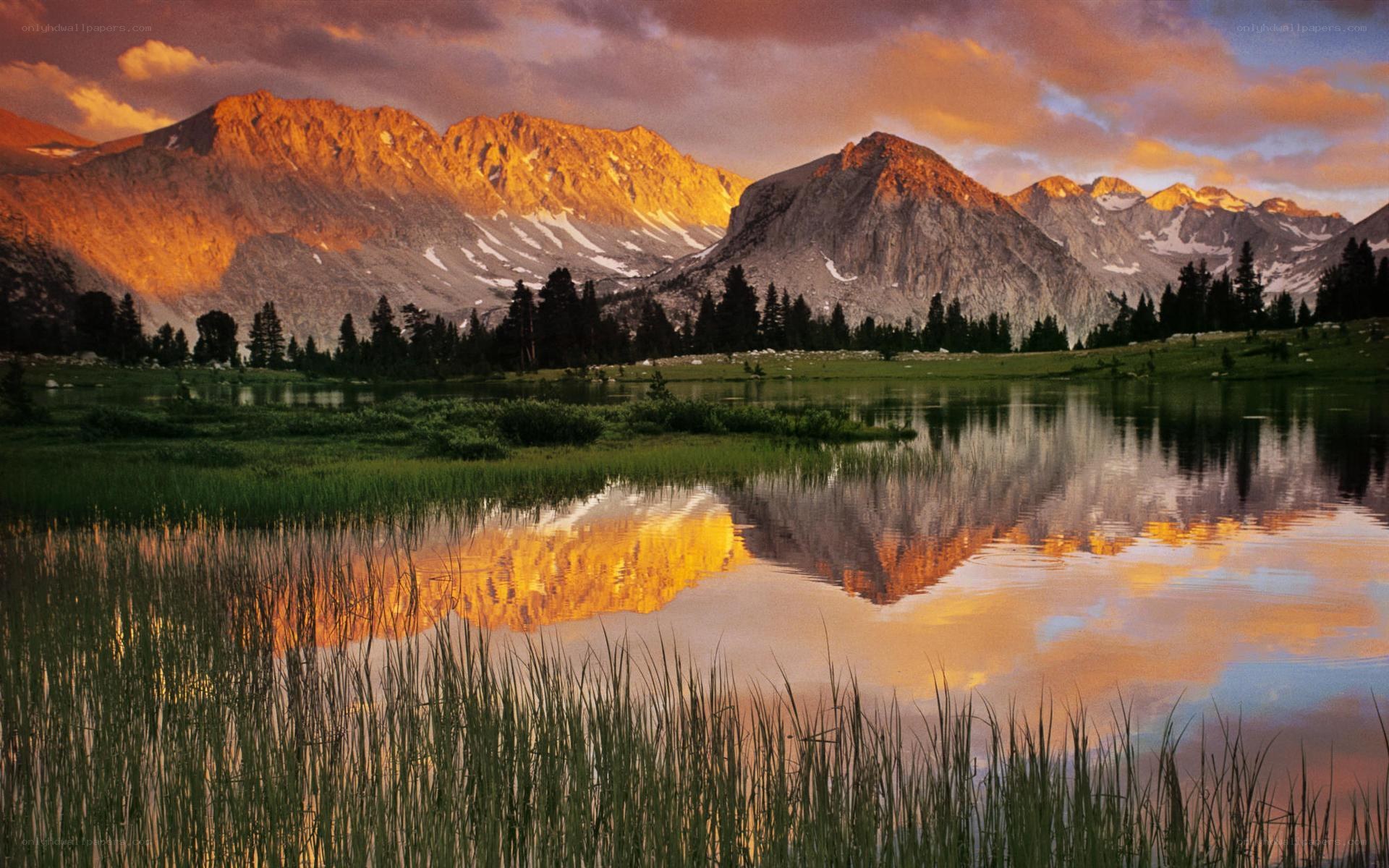Mountain sunset over a lake