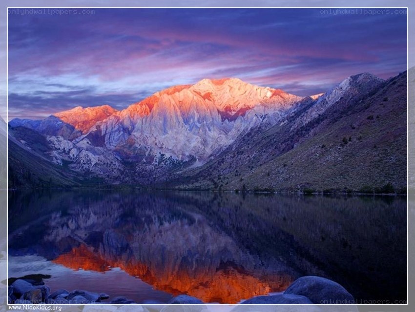 Mountain sunset over a lake