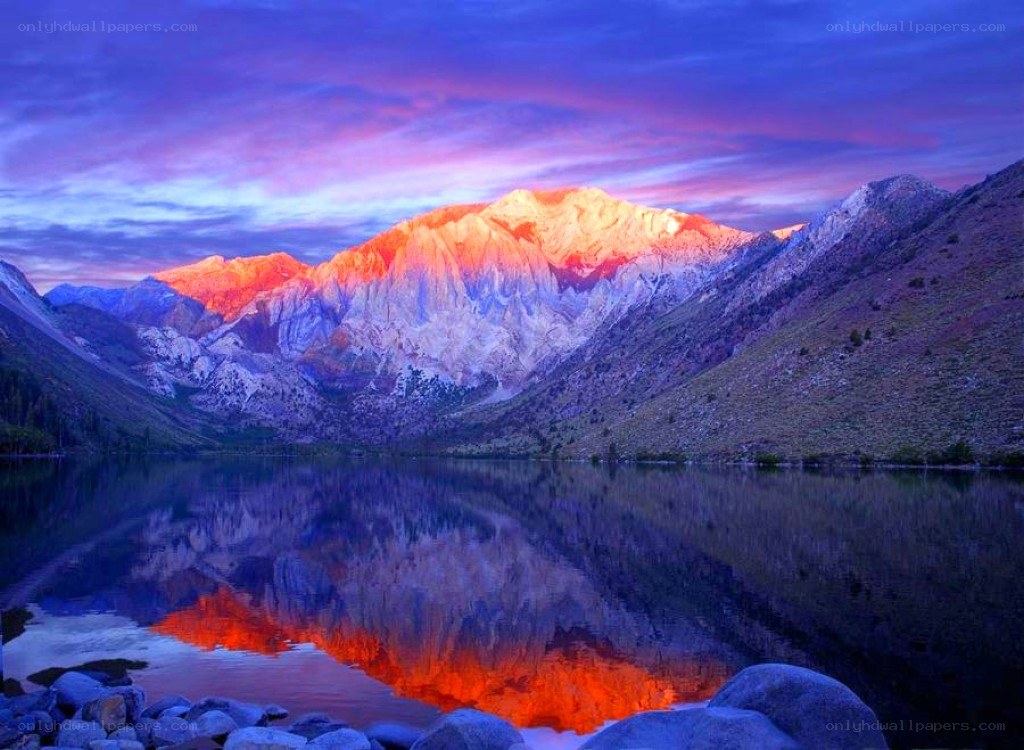 Mountain sunset over a lake