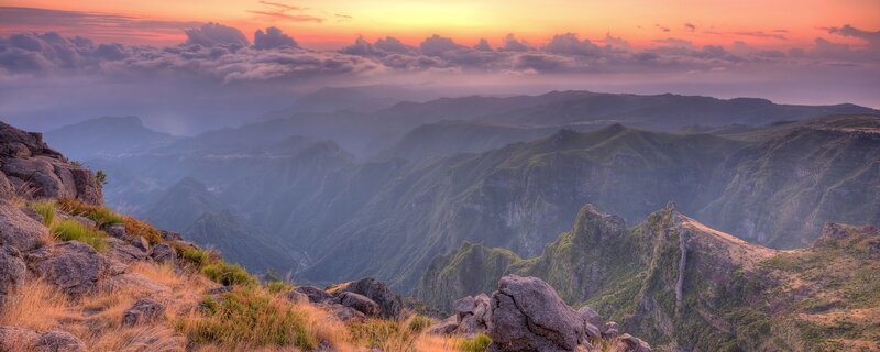 Mountain sunset over a valley