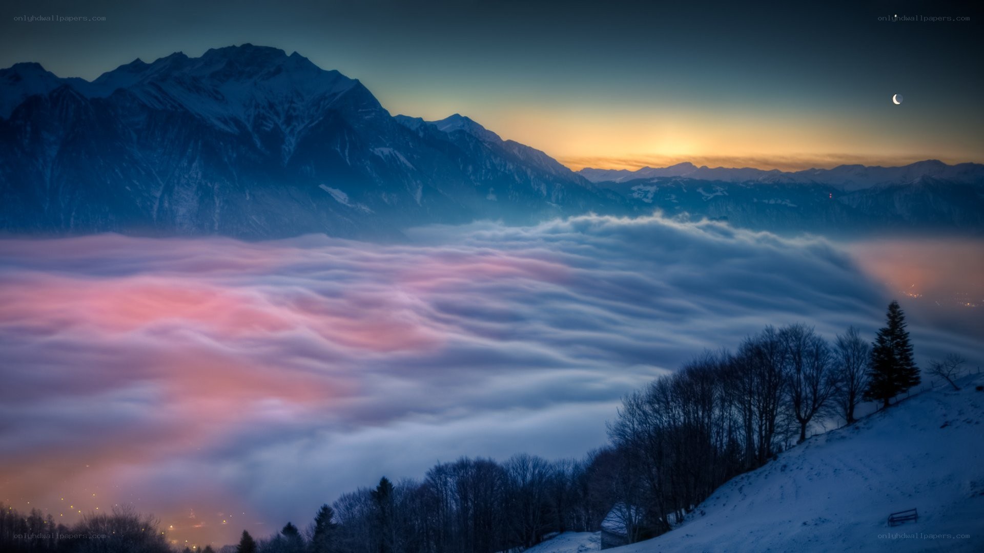 Mountain sunset over cloud sea