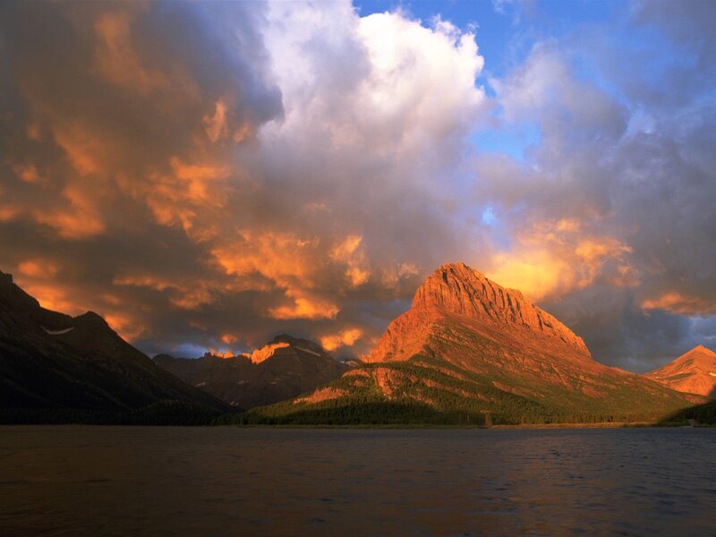 Mountain sunset over lake