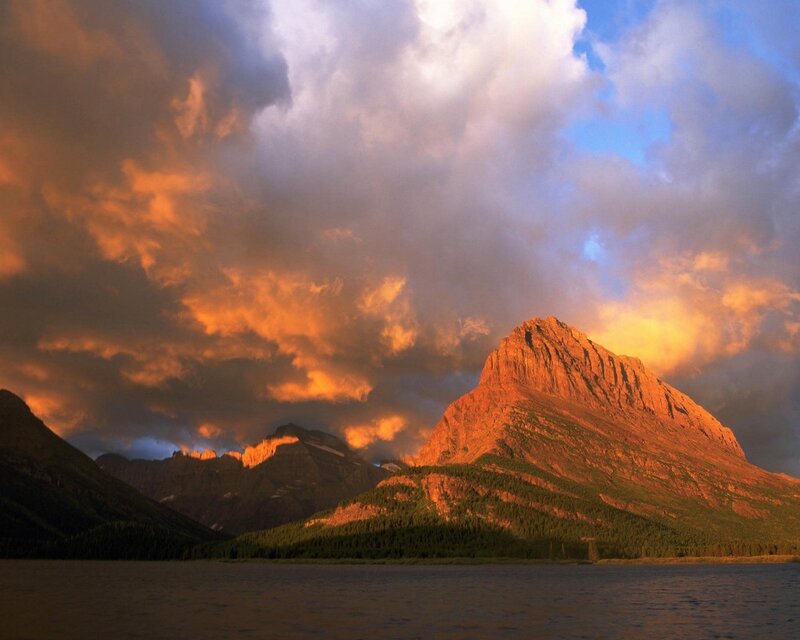 Mountain sunset over lake