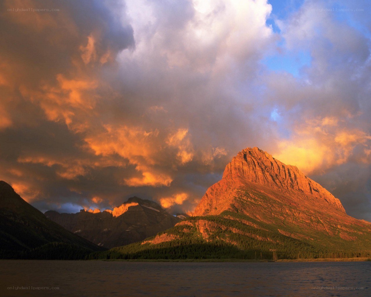 Mountain sunset over lake