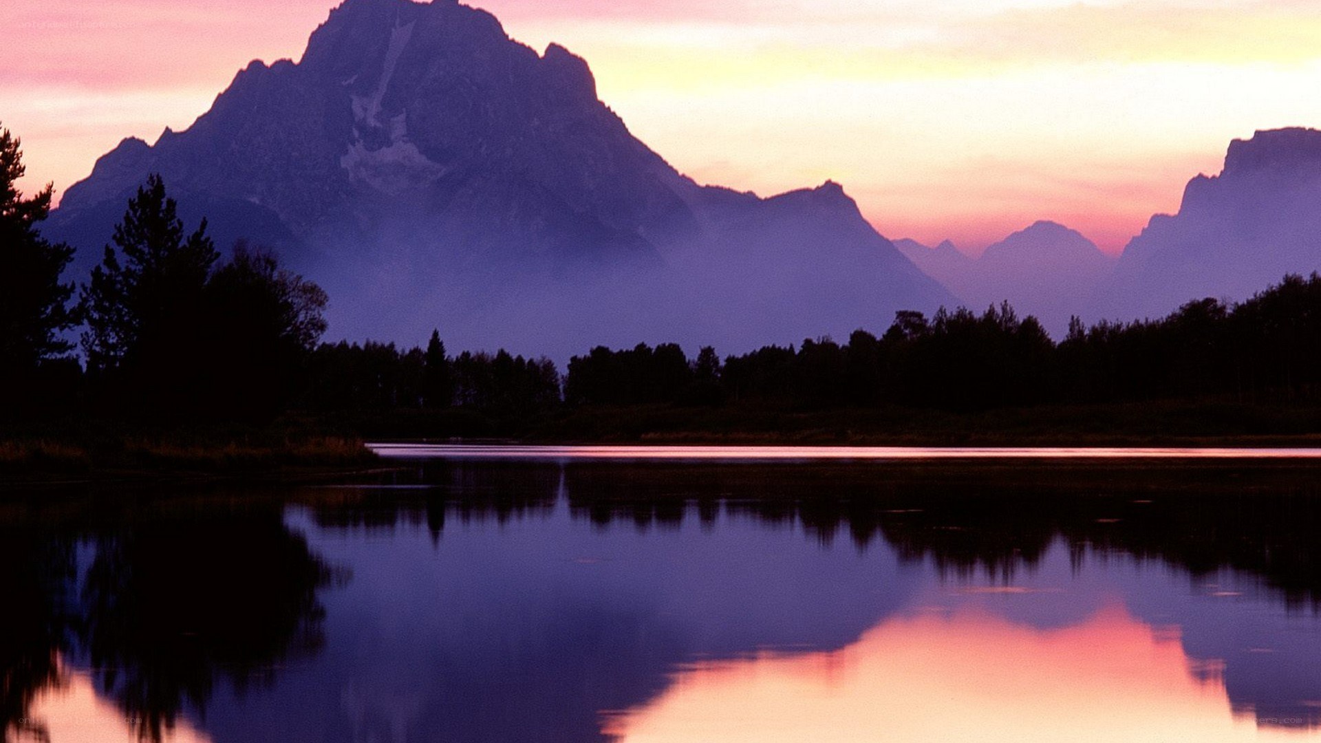 mountain sunset over lake