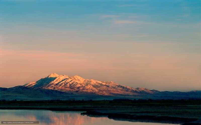 Mountain sunset over lake