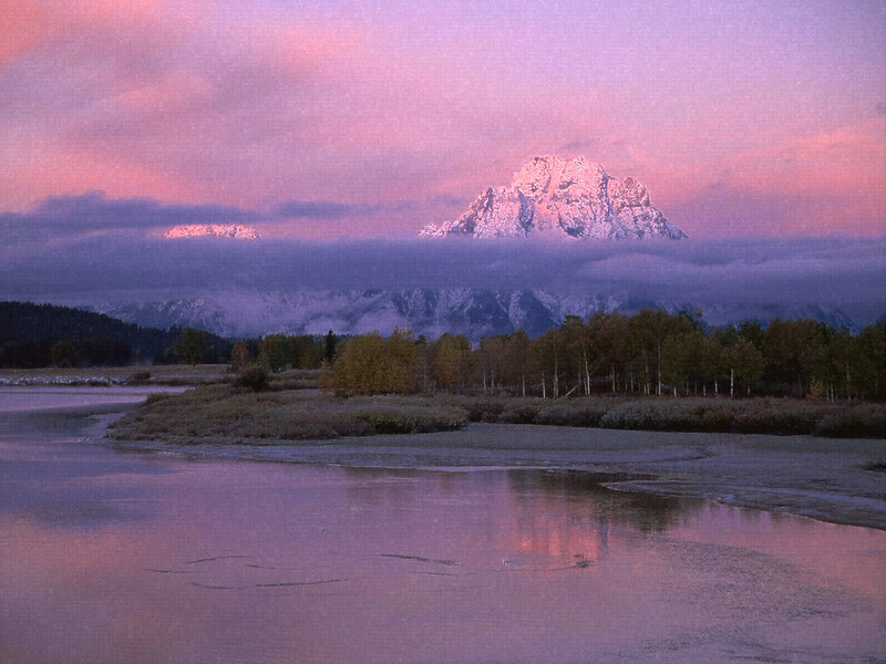 Mountain sunset over river