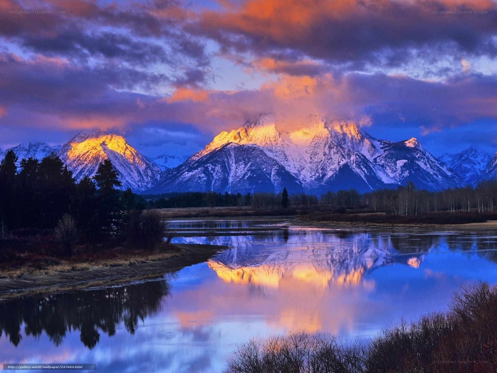 Mountain sunset over river
