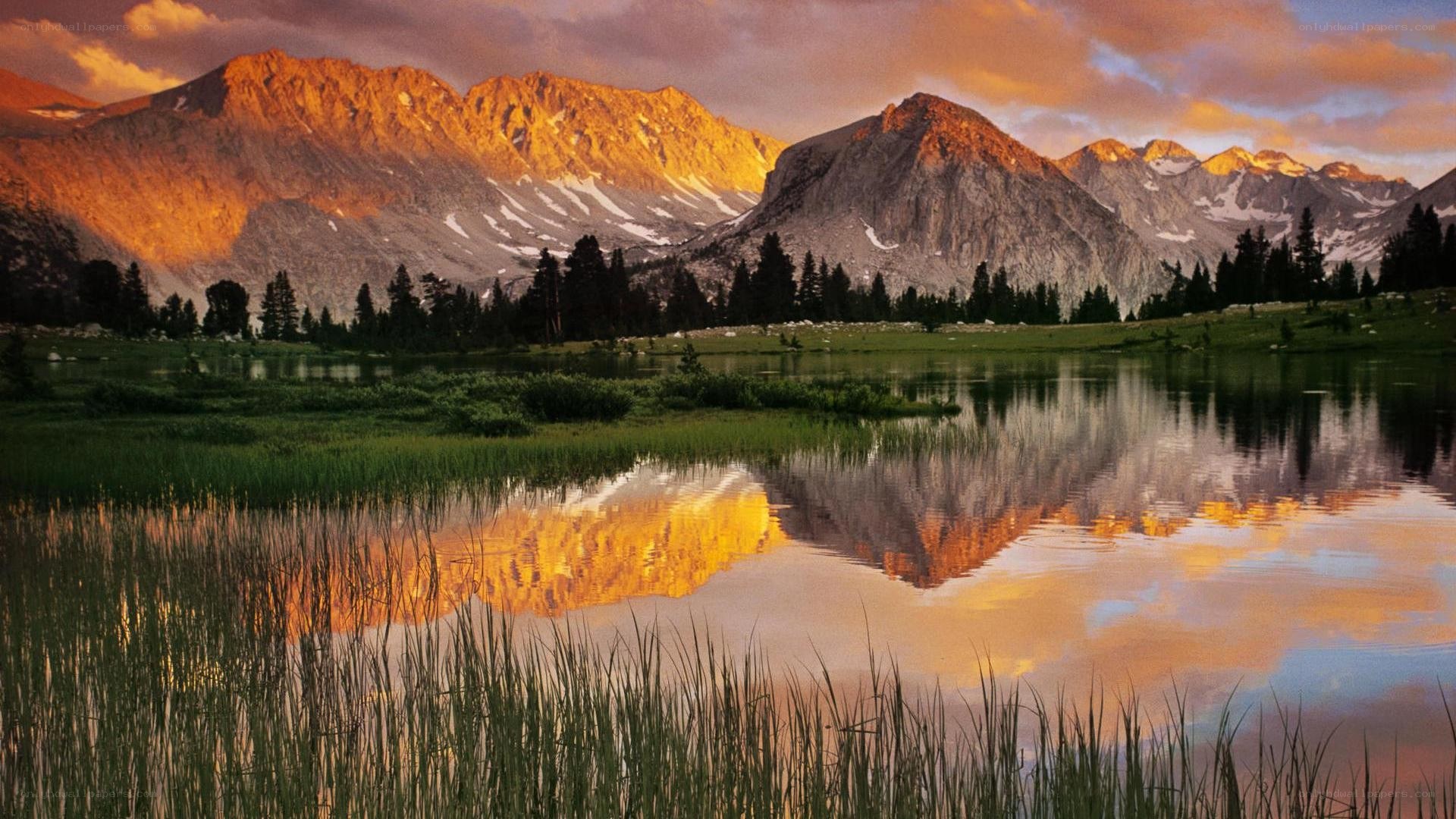Mountain sunset reflected in a lake
