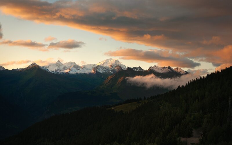 mountain sunset with clouds