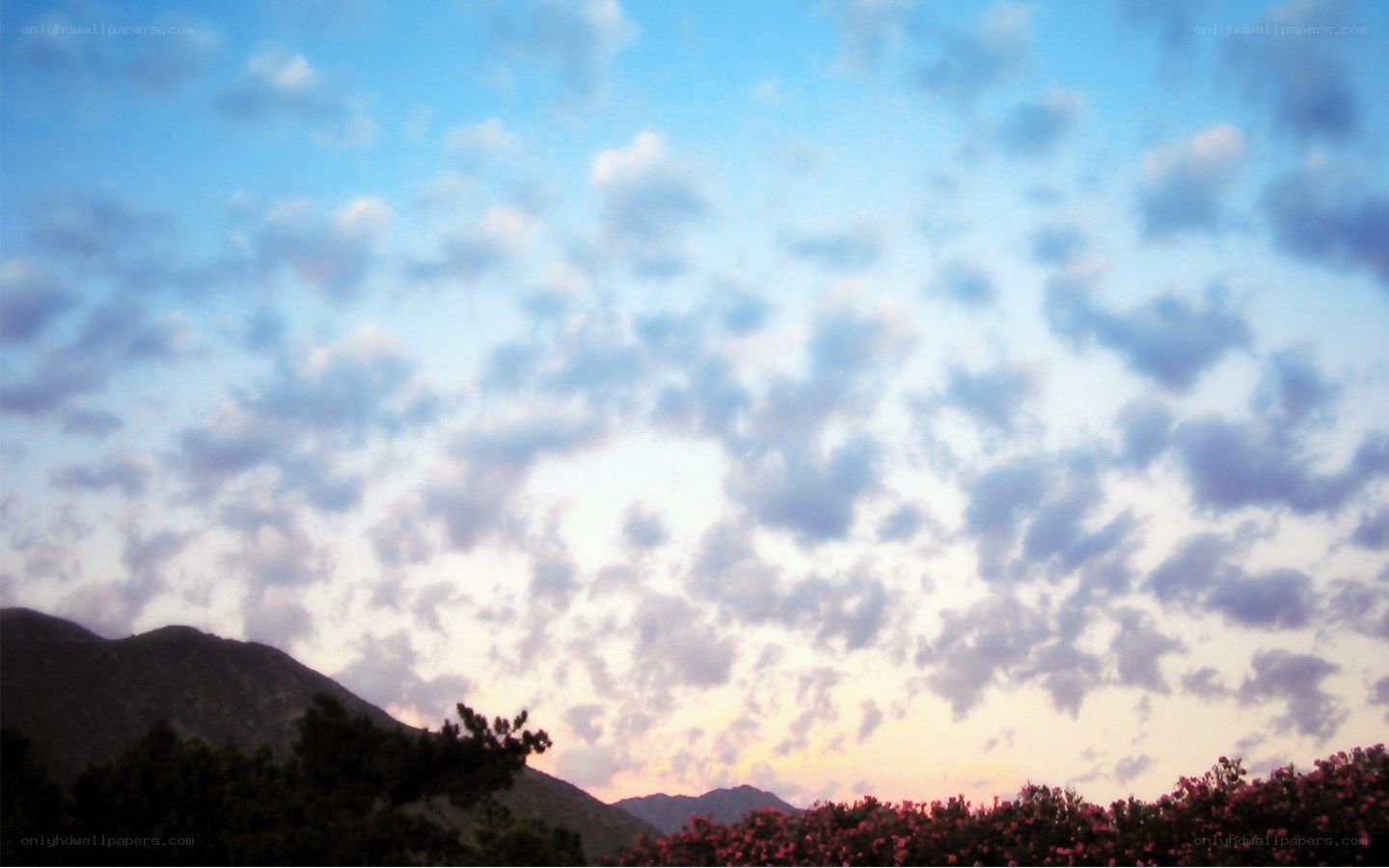 mountain sunset with clouds