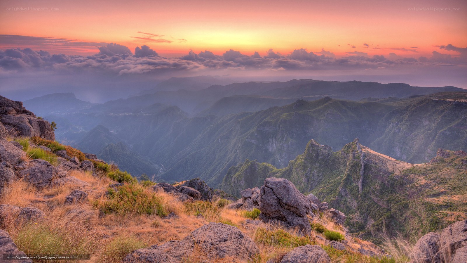 Mountain sunset with clouds