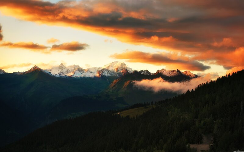 Mountain sunset with clouds