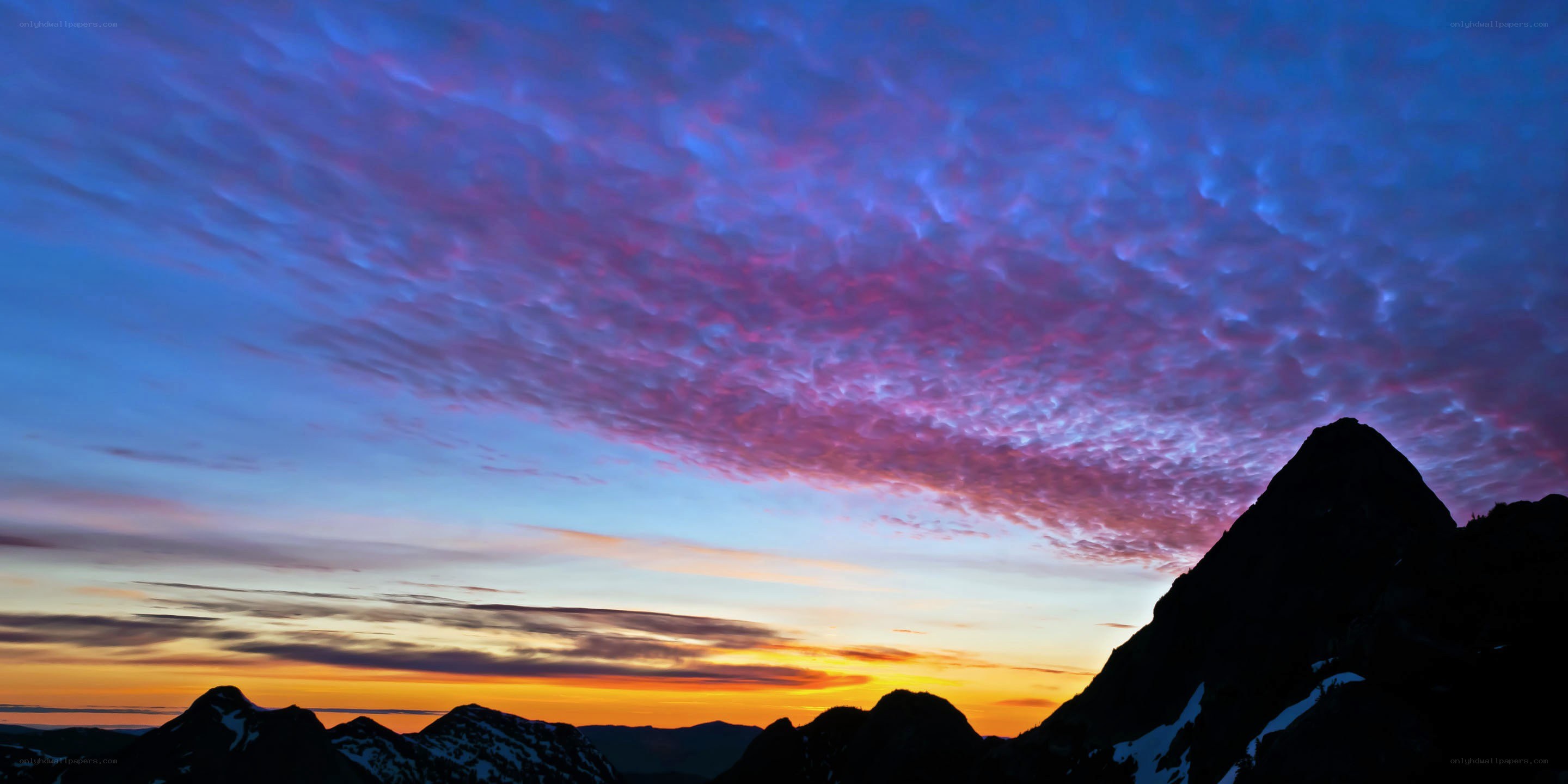 mountain sunset with colorful clouds