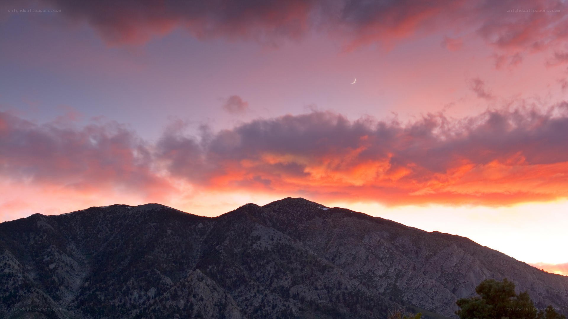 mountain sunset with crescent moon