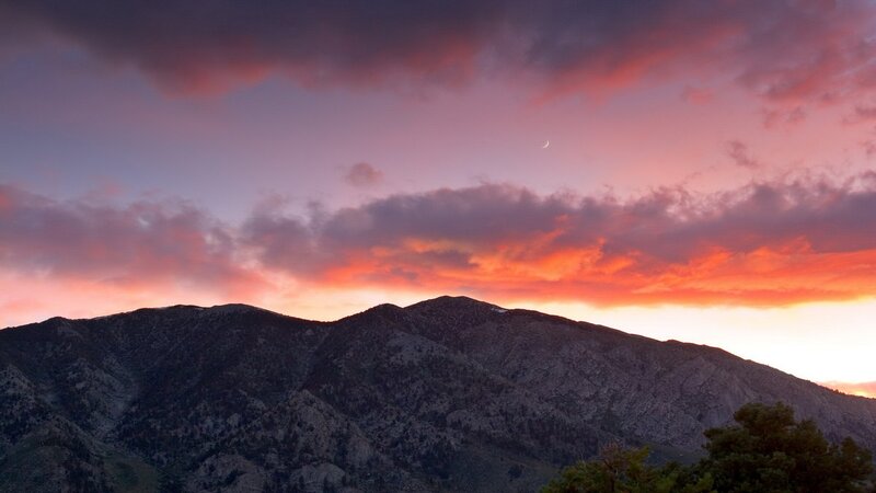 mountain sunset with crescent moon