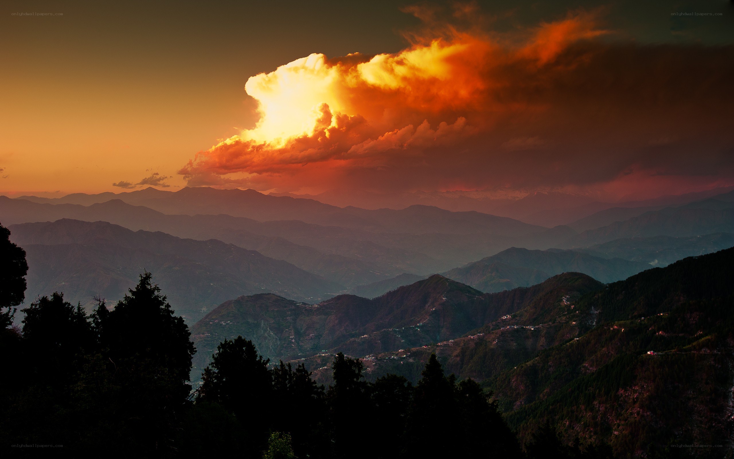 Mountain sunset with dramatic cloud