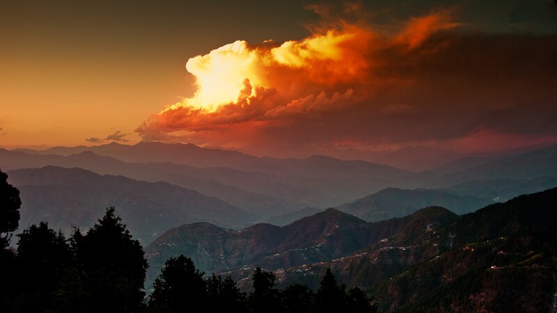 Mountain sunset with dramatic clouds