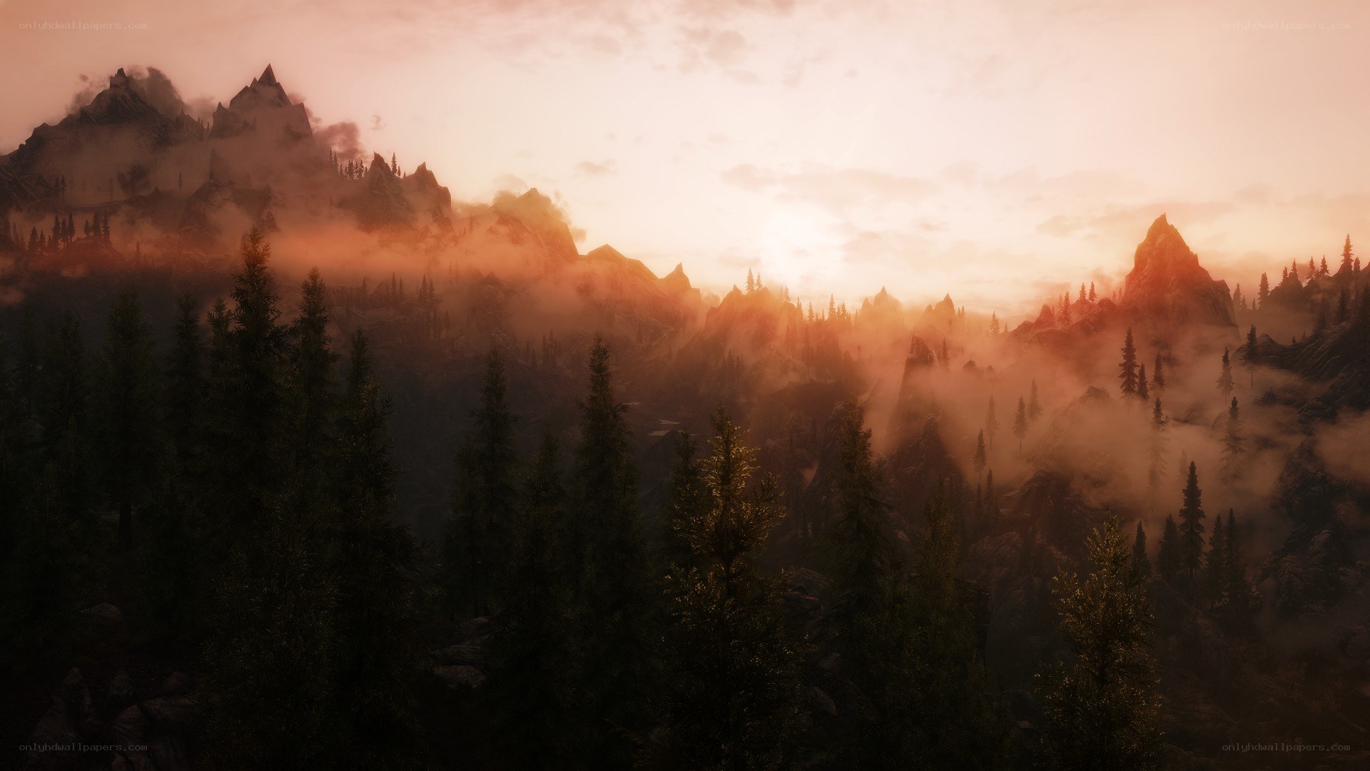 mountain sunset with fog