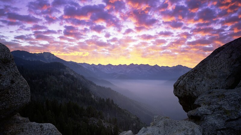 Mountain sunset with fog