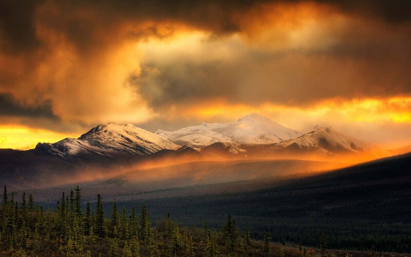 Mountain sunset with forest