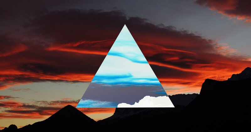 mountain sunset with geometric overlay