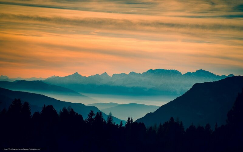 Mountain sunset with layered peaks