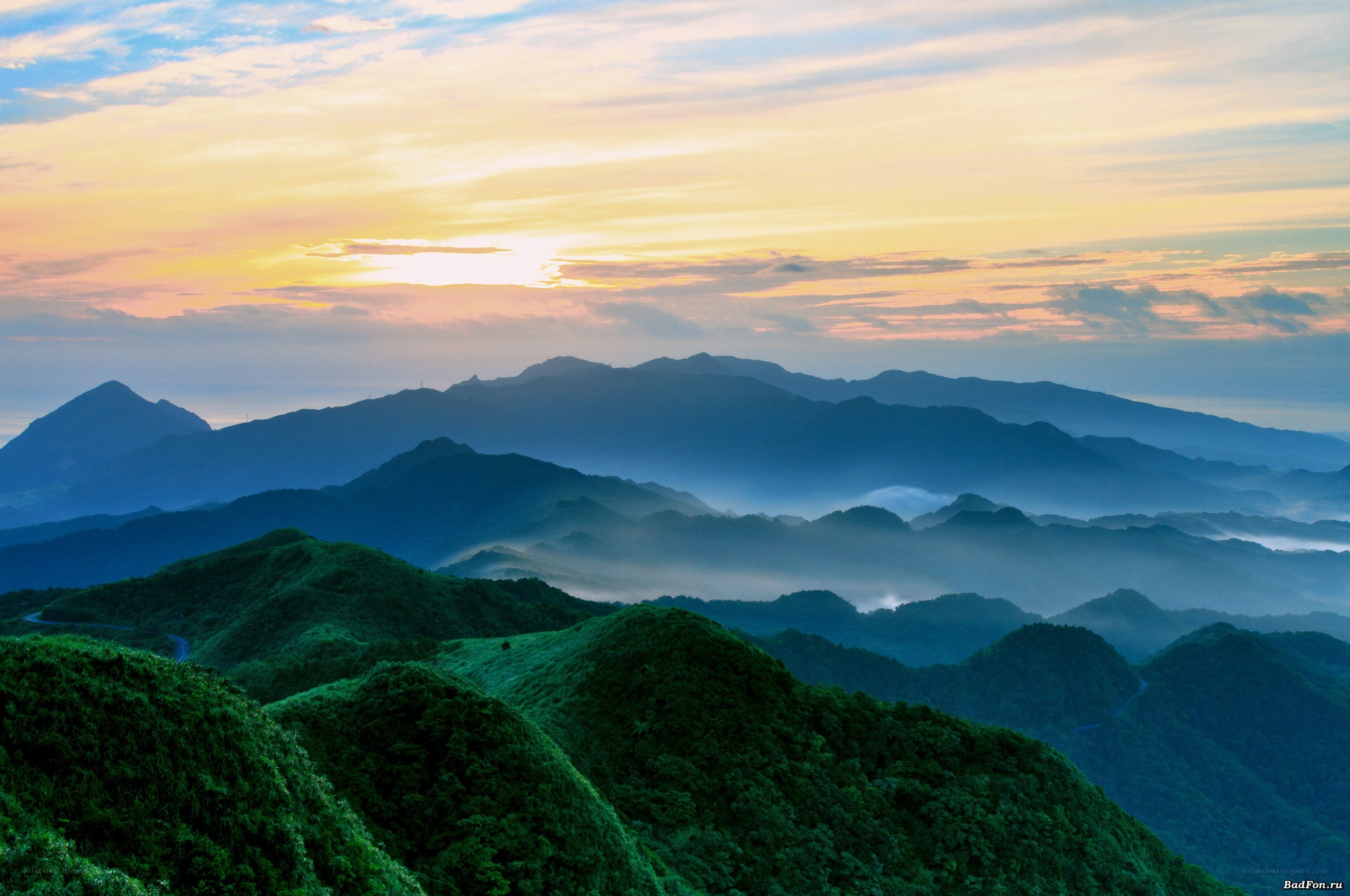 Mountain sunset with mist