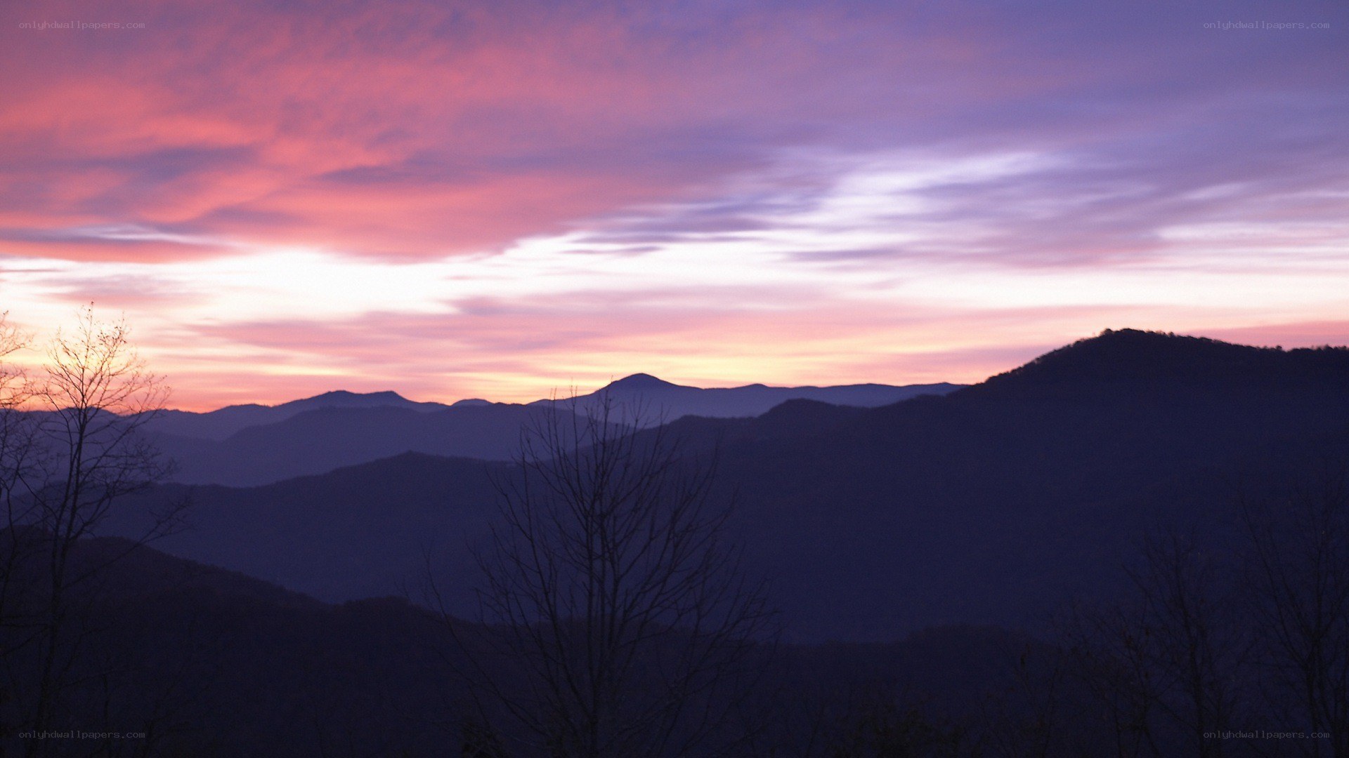 mountain sunset with purple sky