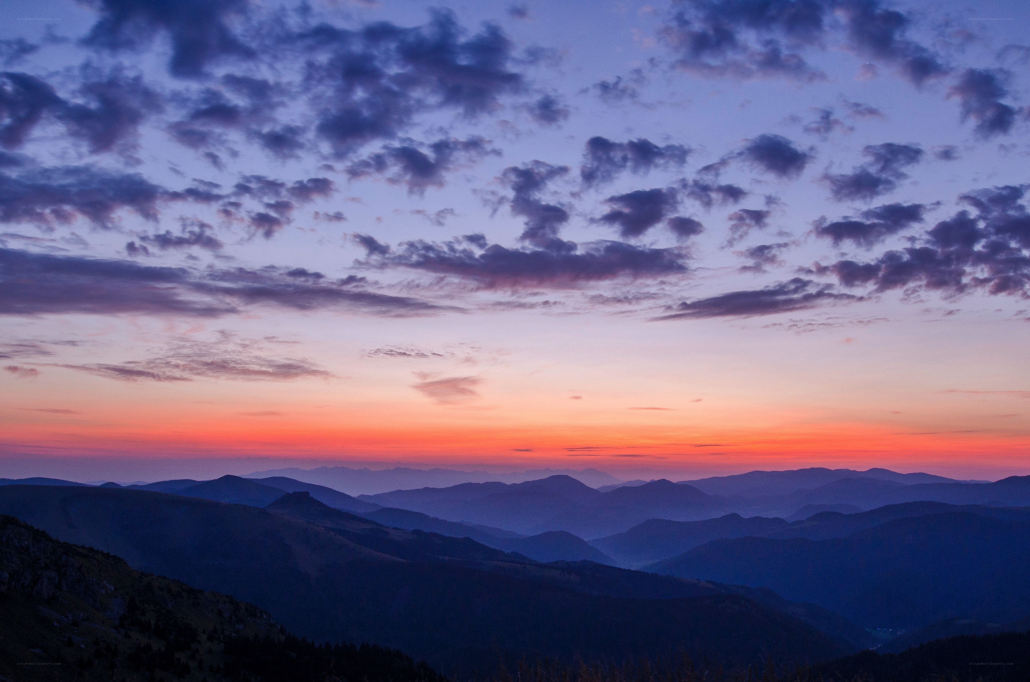 Mountain sunset with purple sky