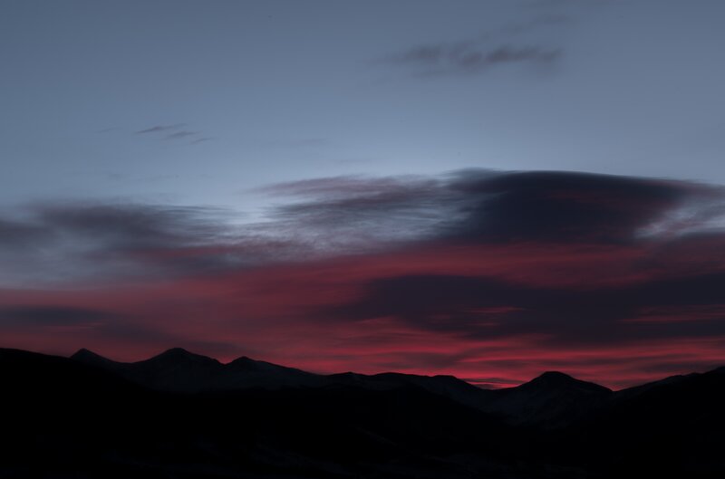Mountain sunset with red clouds