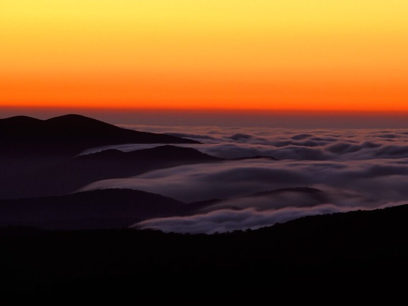 Mountain sunset with sea of clouds