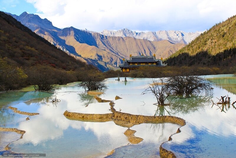 mountain temple by turquoise pools