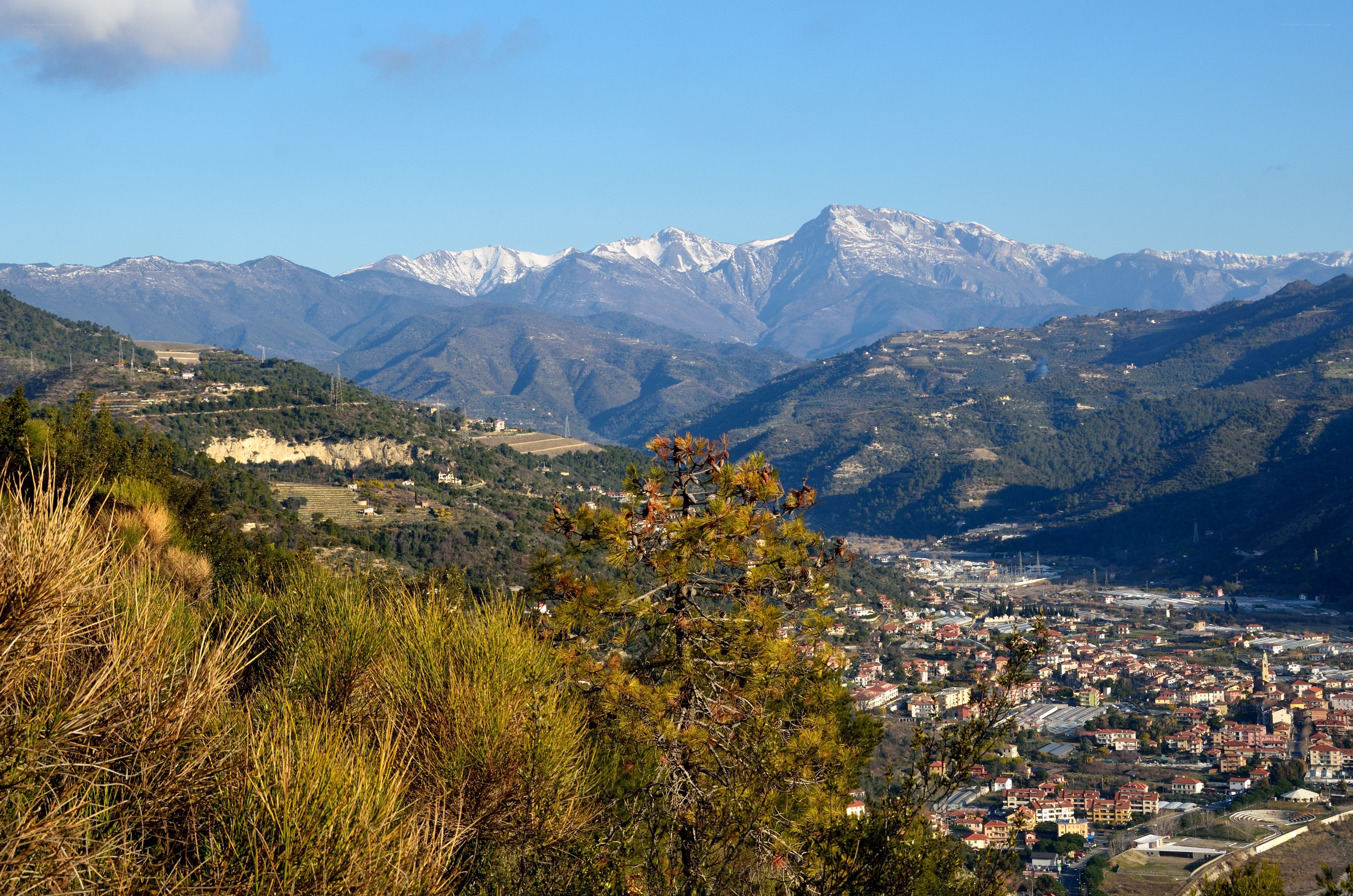 Mountain town with snow-capped peaks
