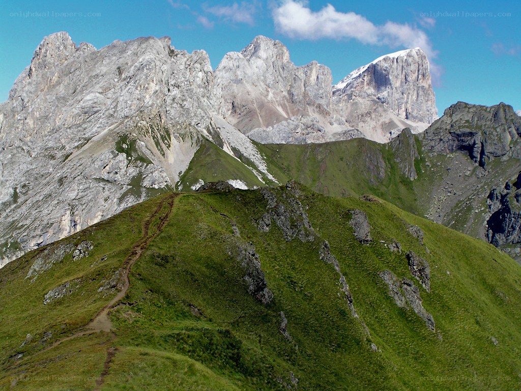 Mountain trail with rocky peaks
