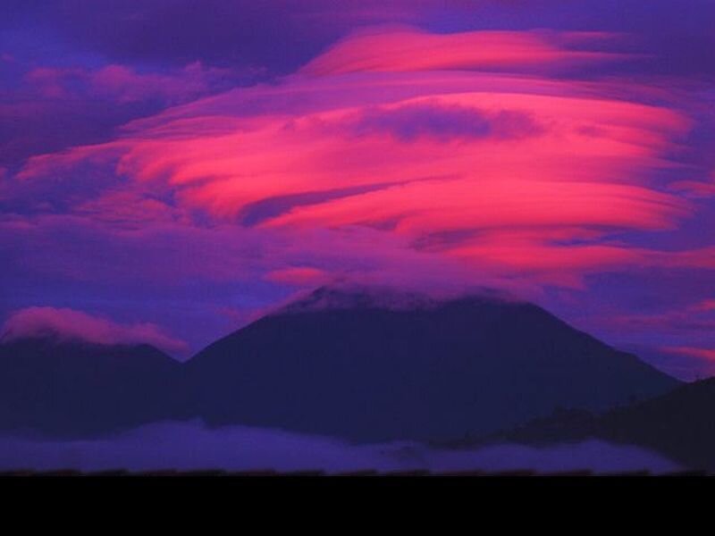 Mountain under Lenticular Clouds