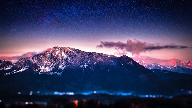 Mountain under starry sky