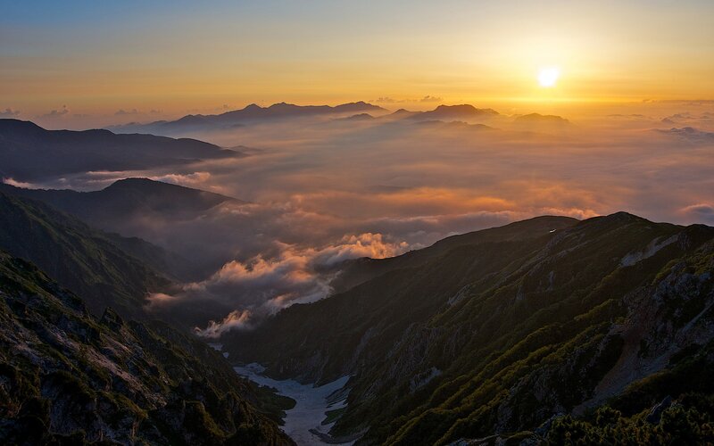 Mountain Valley at Sunrise — Orange, Serene, Photograph, Sun, Clouds