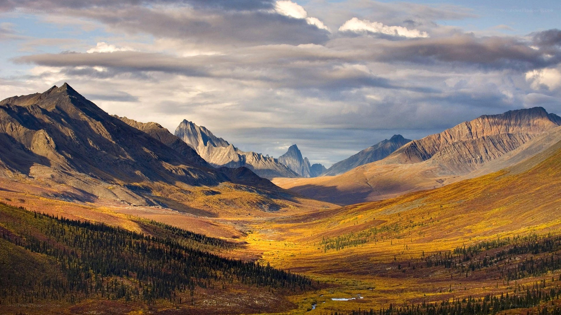 Mountain valley at sunset