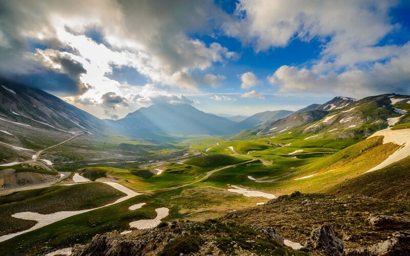 Mountain Valley Landscape — Green, Dramatic, Afternoon, Photograph, Mountains, Clouds, Road