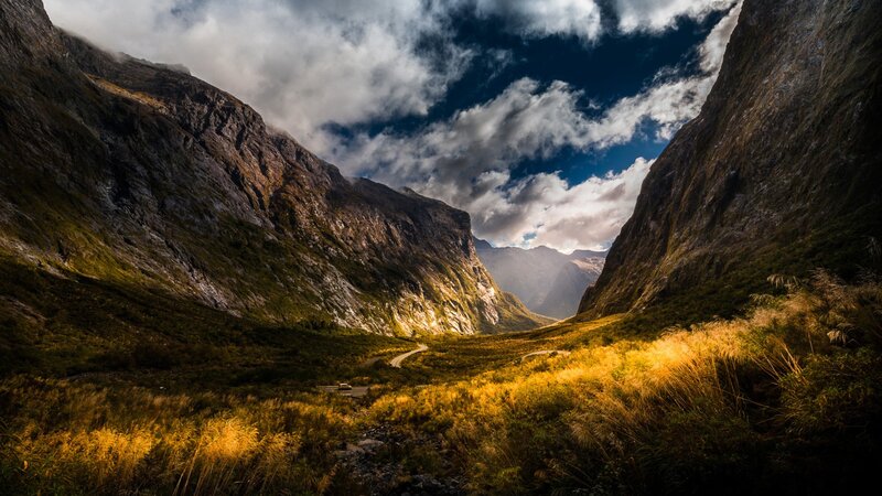 Mountain Valley Landscape — Green, Dramatic, Afternoon, Photograph, Road, Clouds, Grass