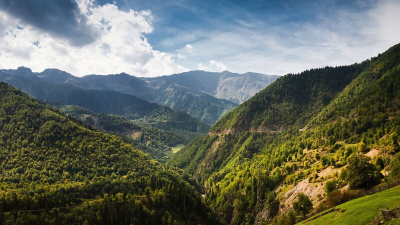 Mountain Valley Landscape — Green, Serene, Afternoon, Photograph, Forests, Clouds, Power Lines